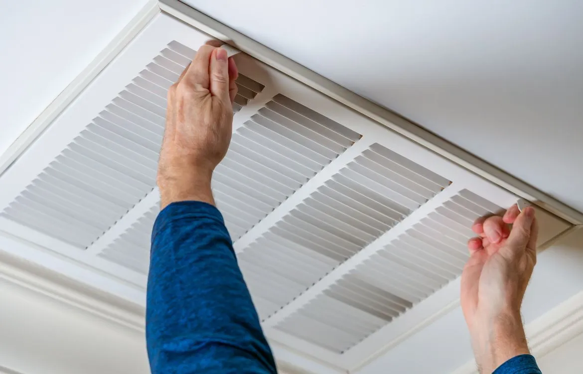 Ducted air conditioning vent in a modern ceiling